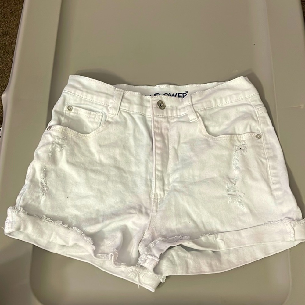 High waisted distressed white shorts